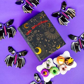  📚✨ Unveil the magic with our Enchanted Spell Book Cake! As you open the pages, watch in awe as bats fly out, revealing a hidden treasure of delicious treats and whimsical surprises. This isn’t just dessert—it’s a spellbinding experience perfect for enchanting any celebration! 🦇🍰🔮

 gift  