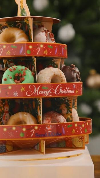 Tree? Check. Lights? Check. Donut tower? DOUBLE CHECK. 🎄🍩

     